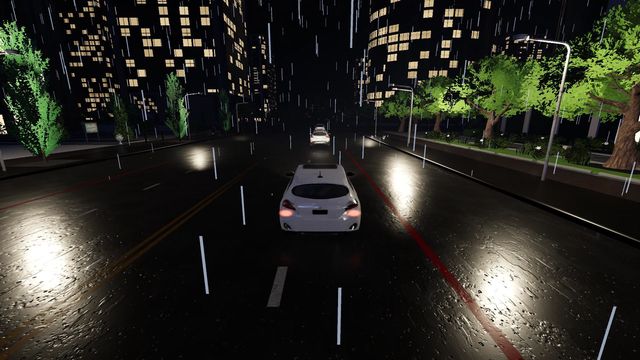 Driving through the city in the rain at night